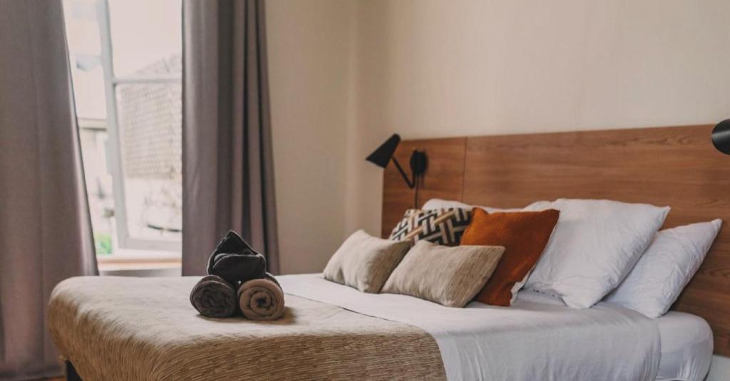 Postel nebo postele na pokoji v ubytování Yogi hostels