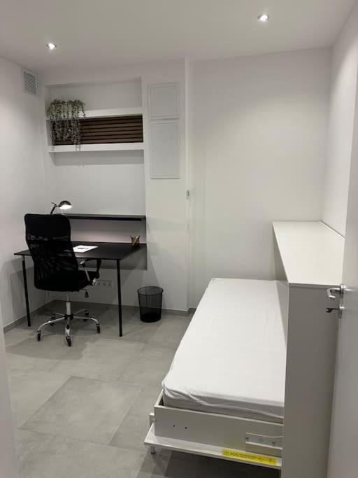 Kuchyň nebo kuchyňský kout v ubytování Comfort Apartment