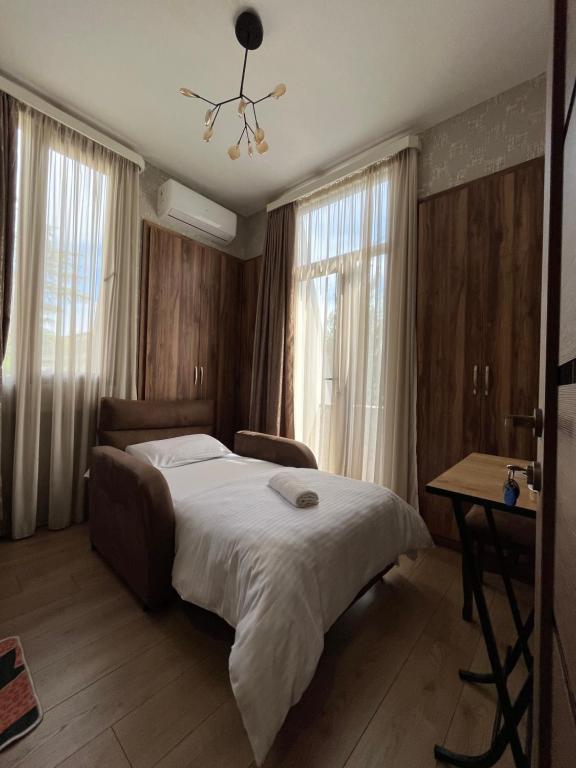 Llit o llits en una habitació de Veranda L&G