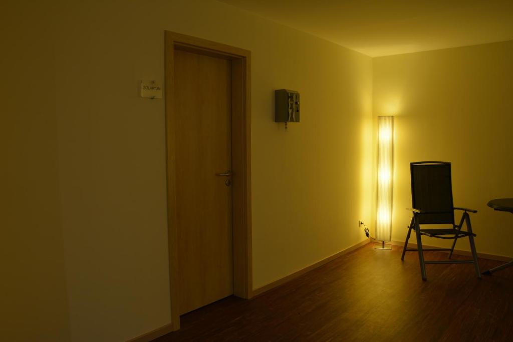 TV a/nebo společenská místnost v ubytování Boutique Hotel Wolfsburg