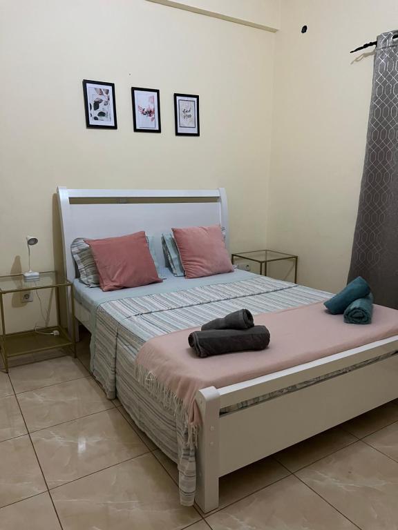 Ένα ή περισσότερα κρεβάτια σε δωμάτιο στο Good Dreams Apartment