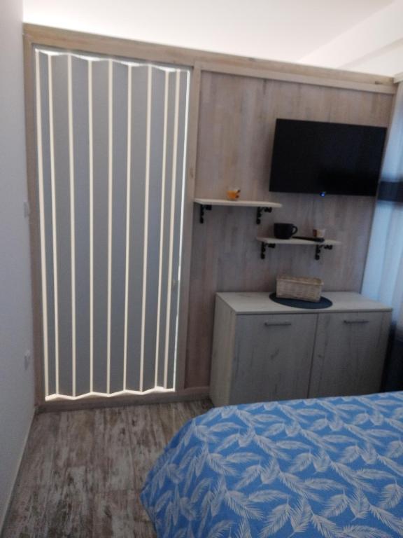 Postel nebo postele na pokoji v ubytování Apartman Vasilije