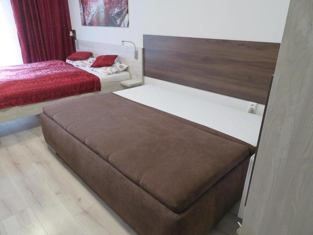 Postel nebo postele na pokoji v ubytování Apartmán Bohemia