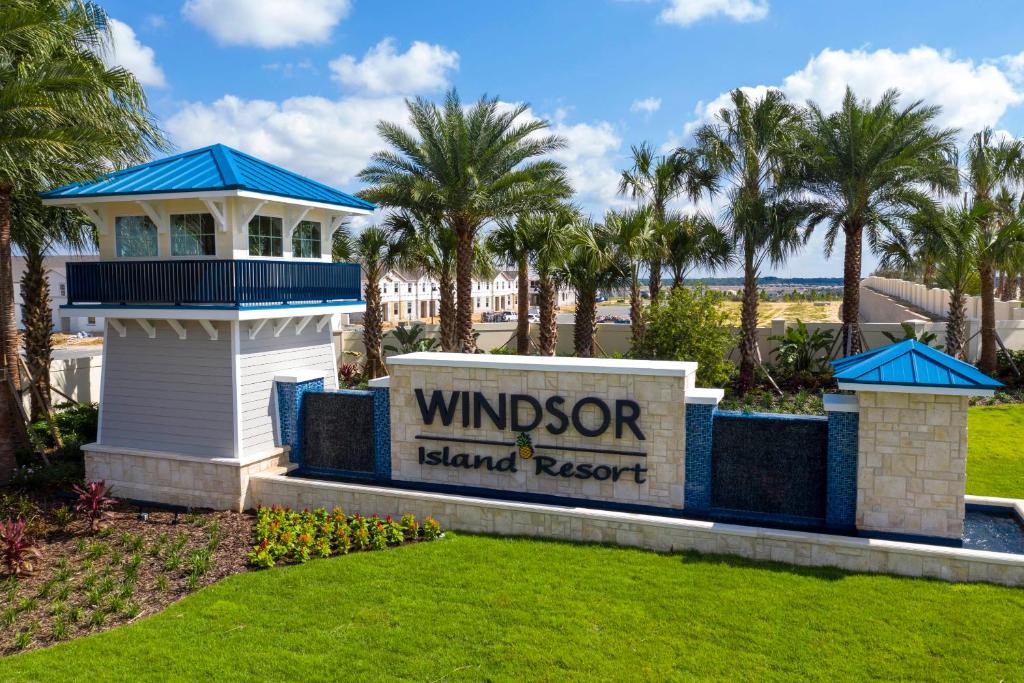 a sign for windsor island resort with palm trees at 9 Bed Theatre Rm Stunner in Windsor Island in Davenport