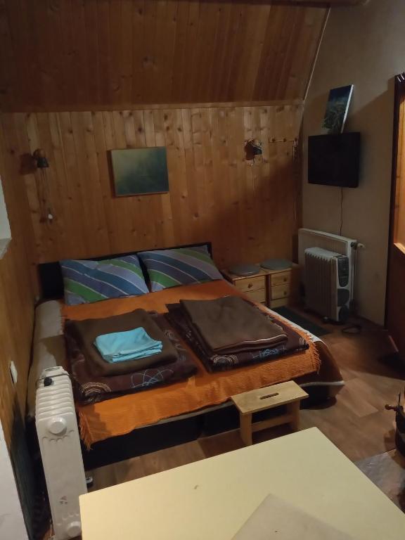 Postel nebo postele na pokoji v ubytování KopanikSkiRooms15E