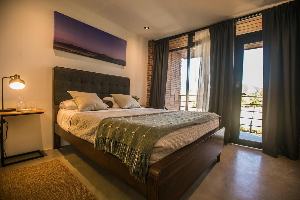 Llit o llits en una habitació de Hotel Otero Valle de Guadalupe