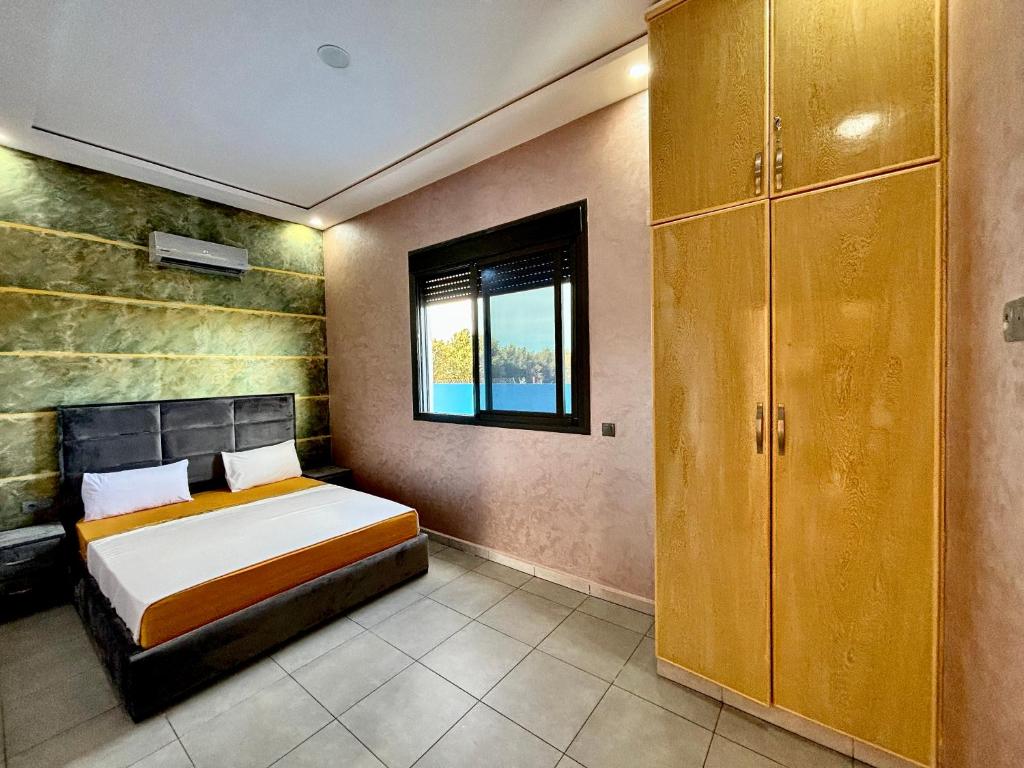Postel nebo postele na pokoji v ubytování Villa Berkane avec Piscine Jacuzzi privée Sans vis-à-vis