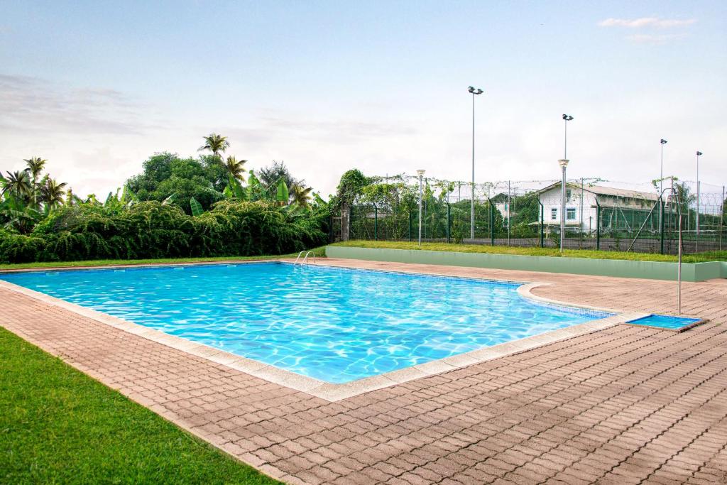 Het zwembad bij of vlak bij Le Privil&egrave;ge appartement standing, piscine, terrasse, jardin, parking priv&eacute;