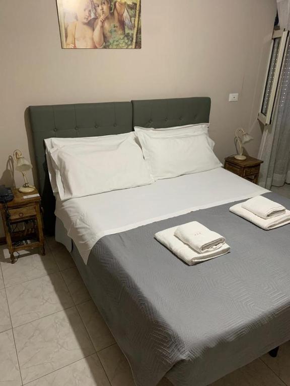 Postel nebo postele na pokoji v ubytování BB Dante