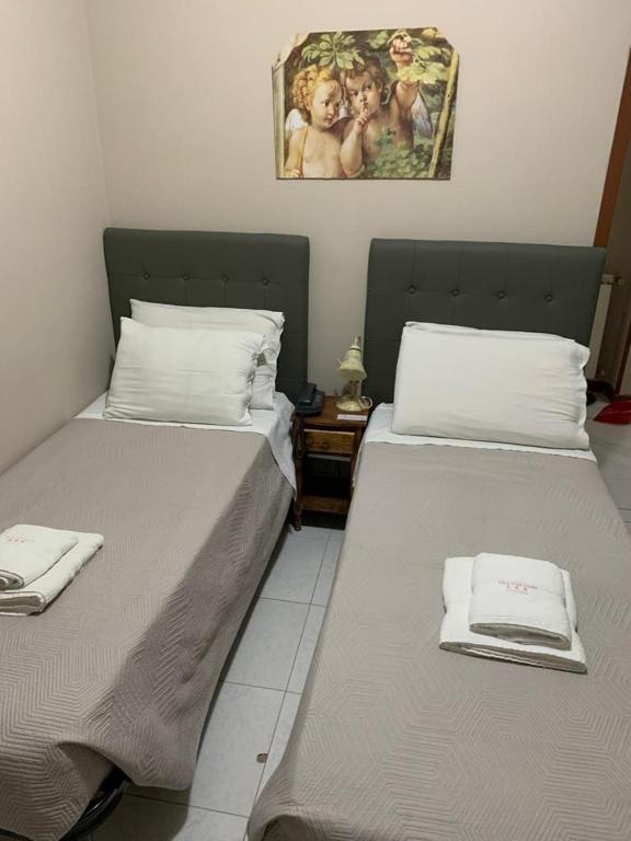 Postel nebo postele na pokoji v ubytování BB Dante