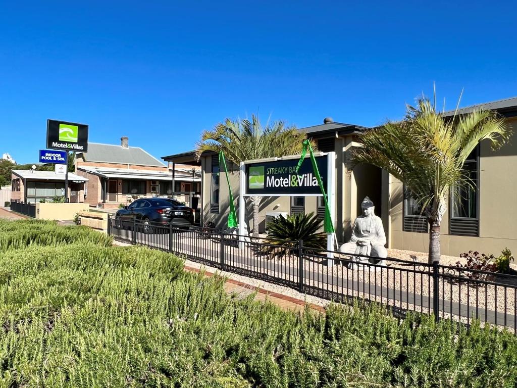 a building with a sign in front of it at Streaky Bay Motel and Villas in Streaky Bay