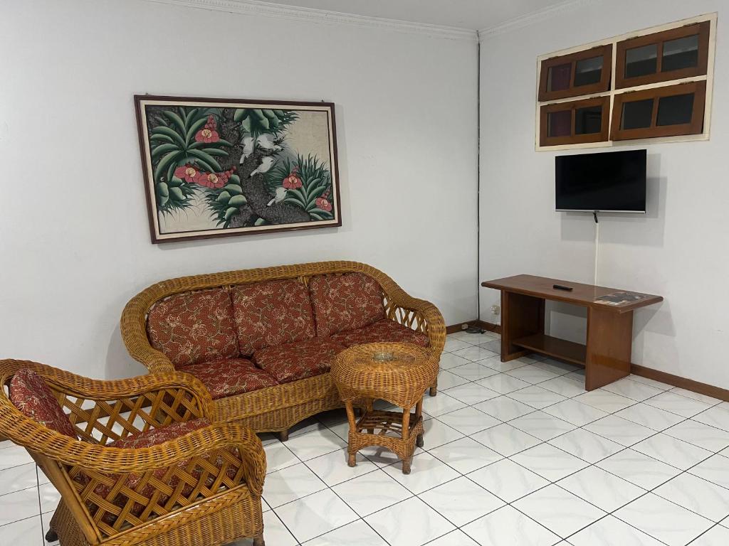 TV a/nebo společenská místnost v ubytování Hotel Puspa Sari
