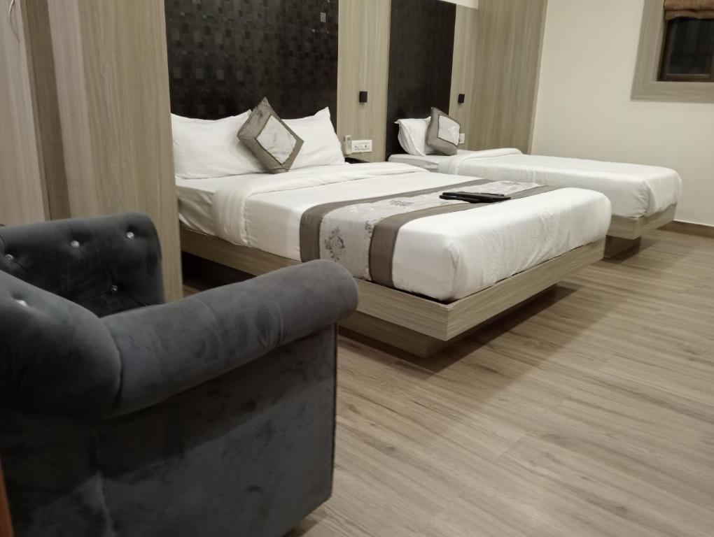 Letto o letti in una camera di Hotel Arts International