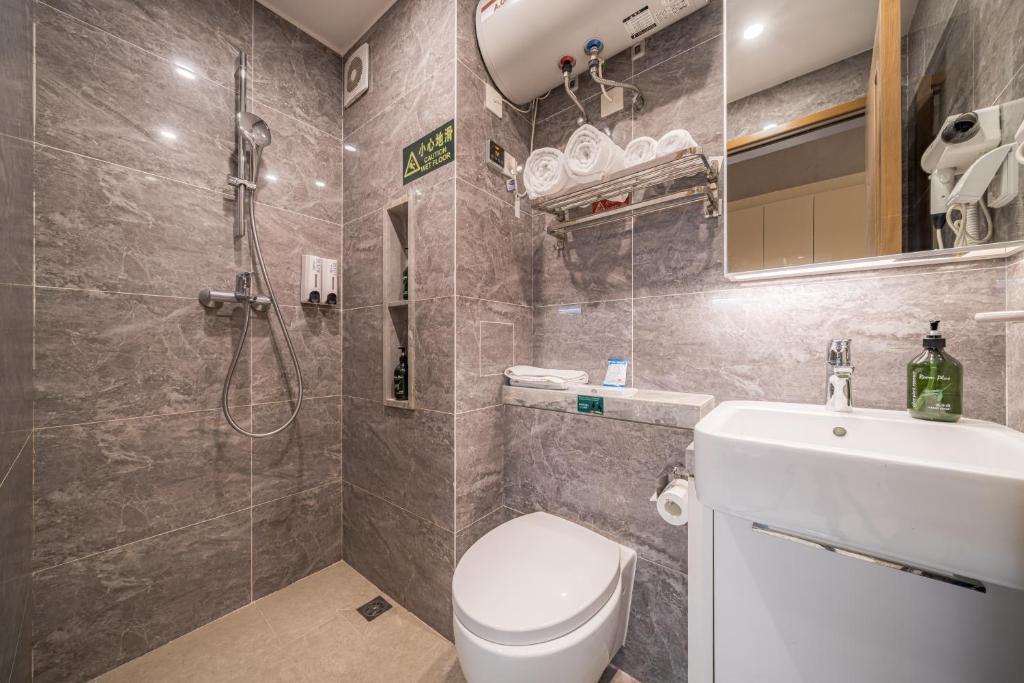 Koupelna v ubytování Gepai Executive Apartment - Shenzhen Futian Convention and Exhibition Center