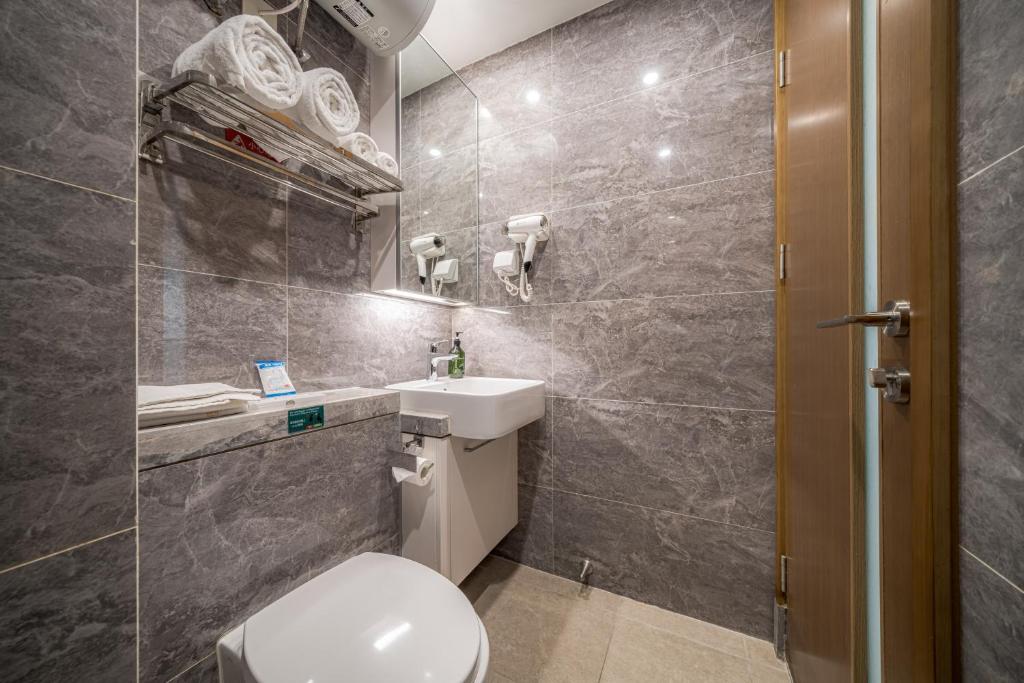 Koupelna v ubytování Gepai Executive Apartment - Shenzhen Futian Convention and Exhibition Center