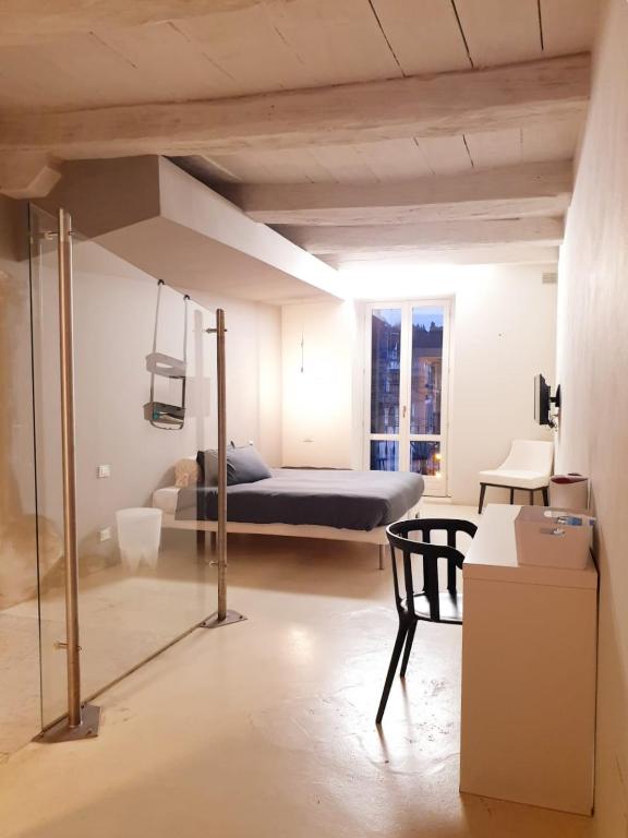 Postel nebo postele na pokoji v ubytování Hotel Aracoeli