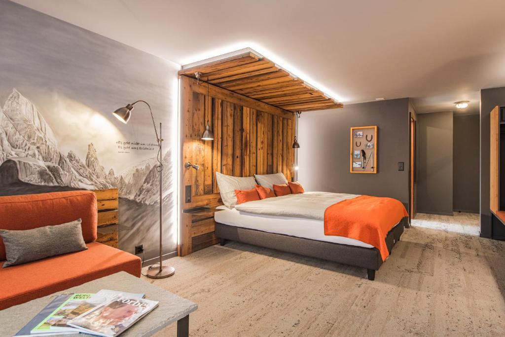 Cama o camas de una habitación en BaseCamp Hotel