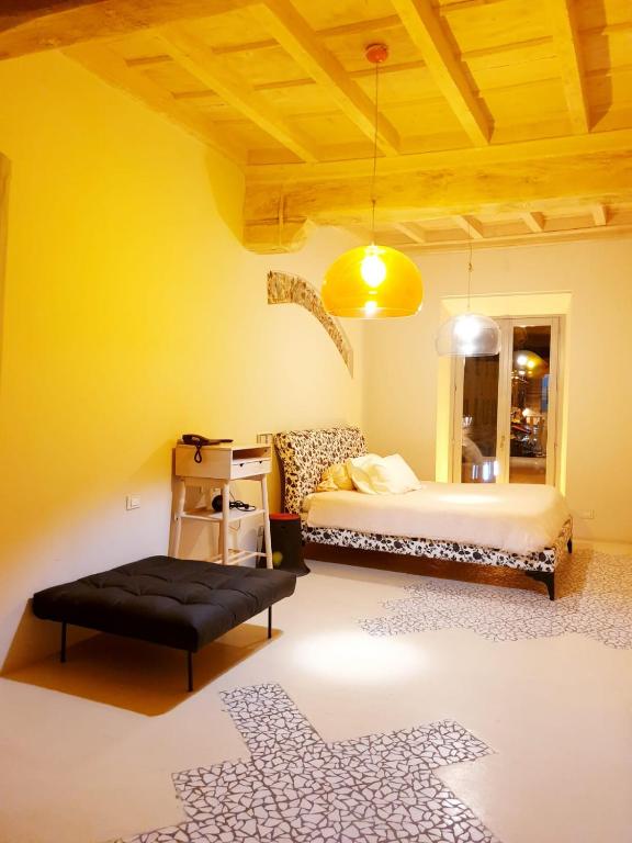 Postel nebo postele na pokoji v ubytování Hotel Aracoeli