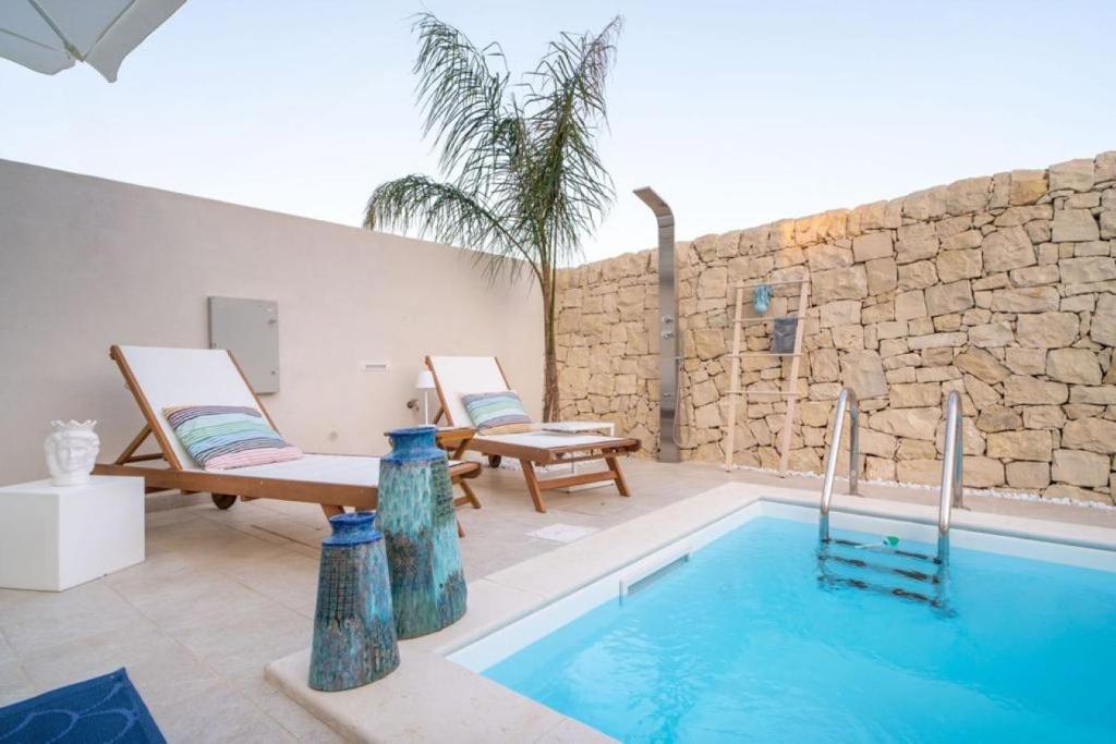 Swimmingpoolen hos eller tæt på Il Borgo Luxury Retreat