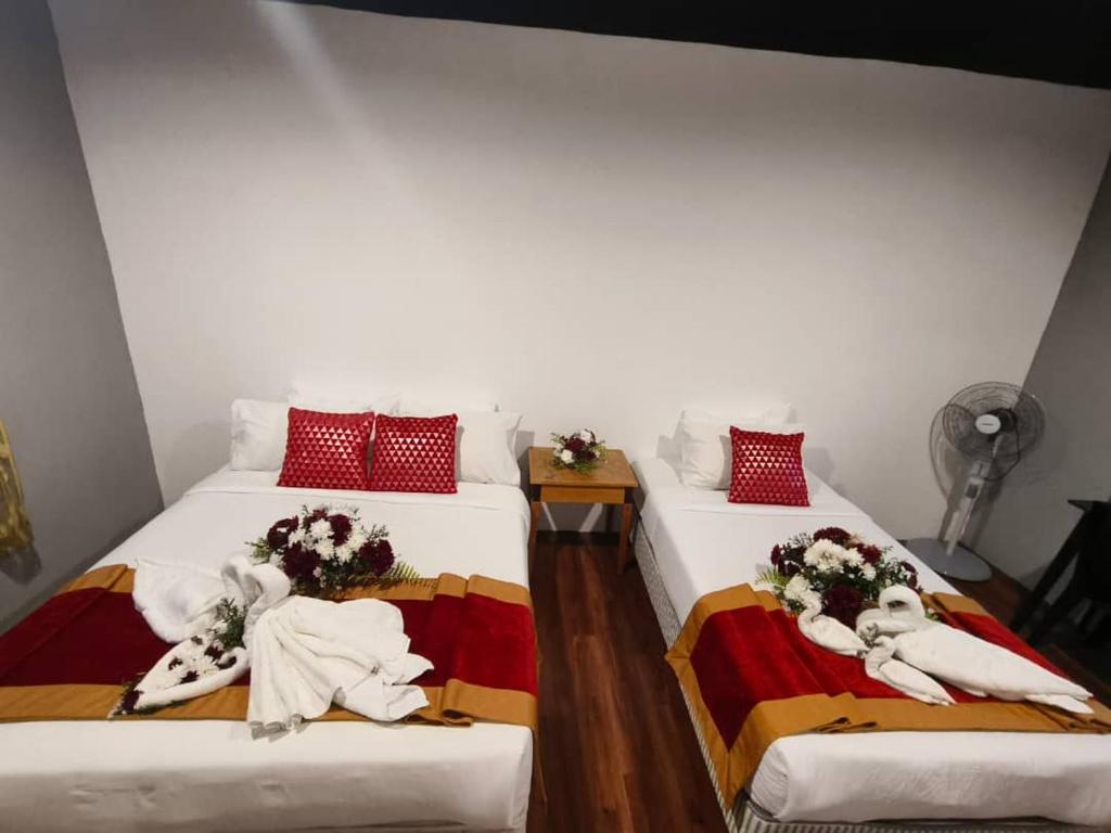 Postel nebo postele na pokoji v ubytování 1 Hati Homestay Sepang