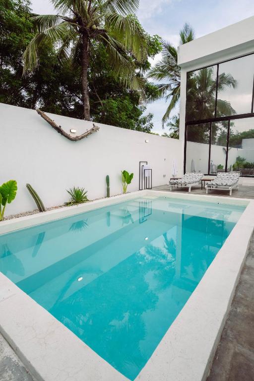 Bazén v ubytování Trio Villas Watamu nebo v jeho okolí
