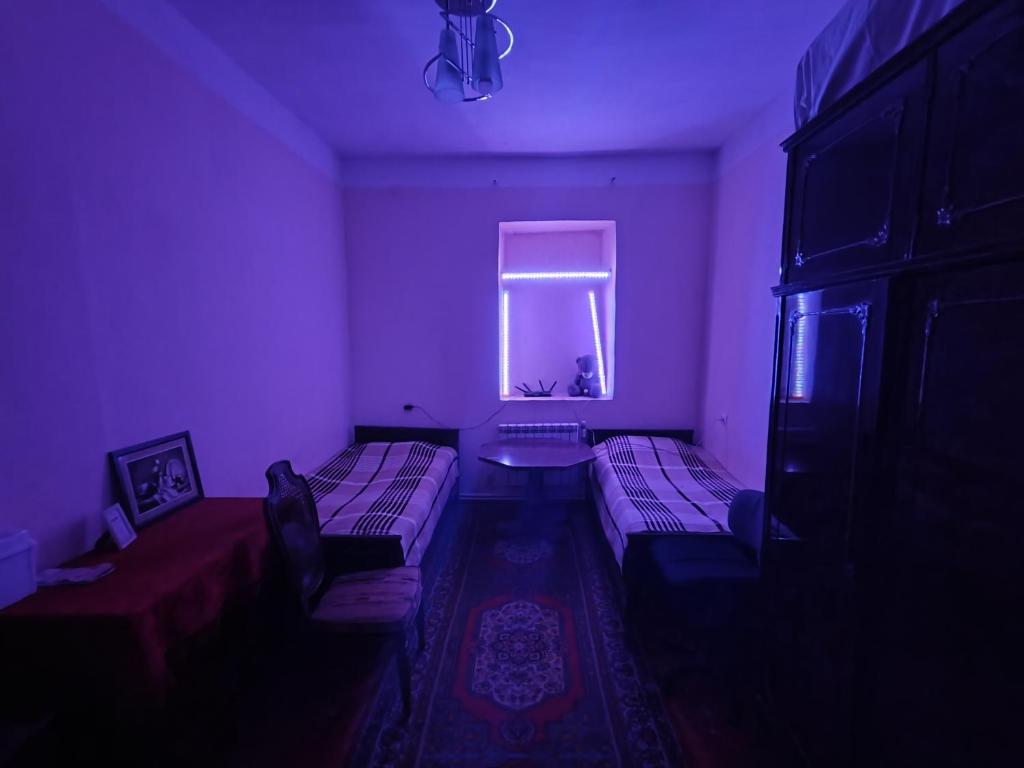 Postel nebo postele na pokoji v ubytování Guest House FloraS