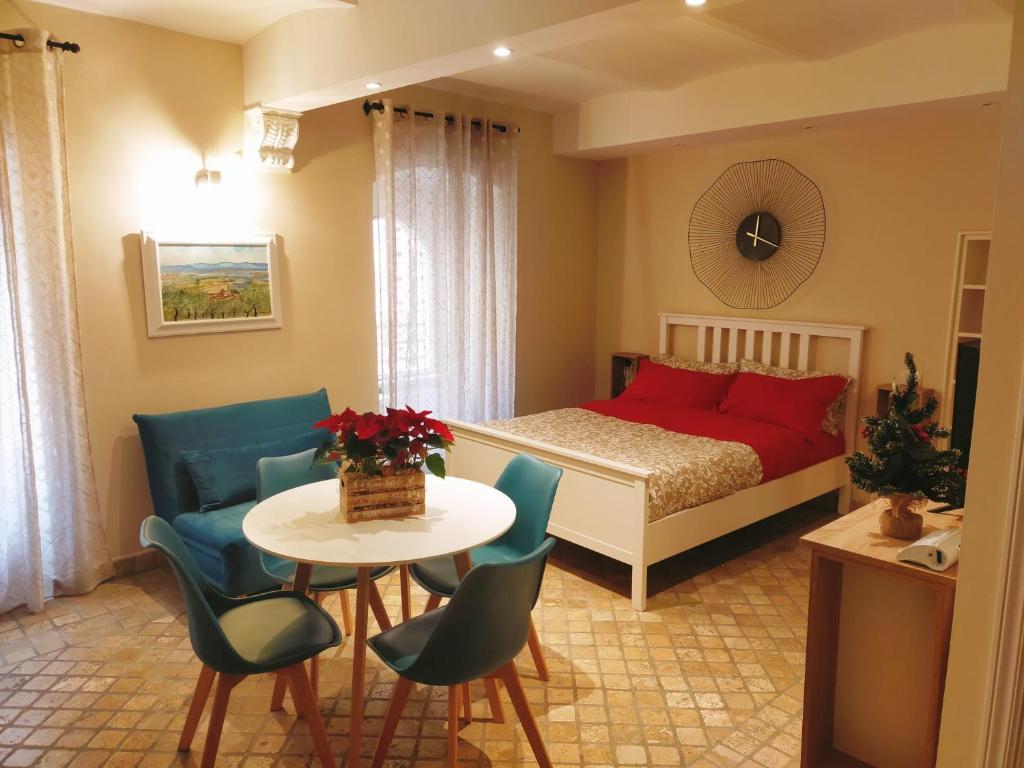 A bed or beds in a room at MancioBiba Home