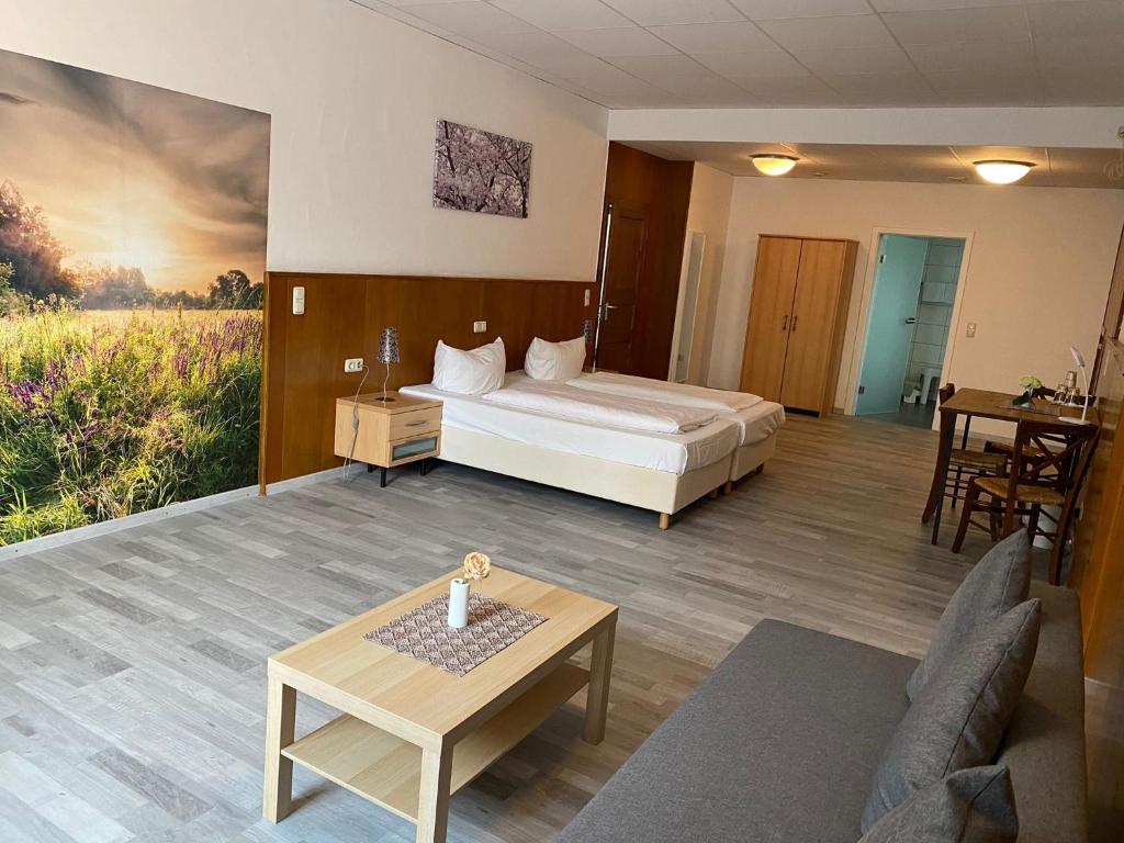 Postel nebo postele na pokoji v ubytování Hotel Sonne - Haus 2