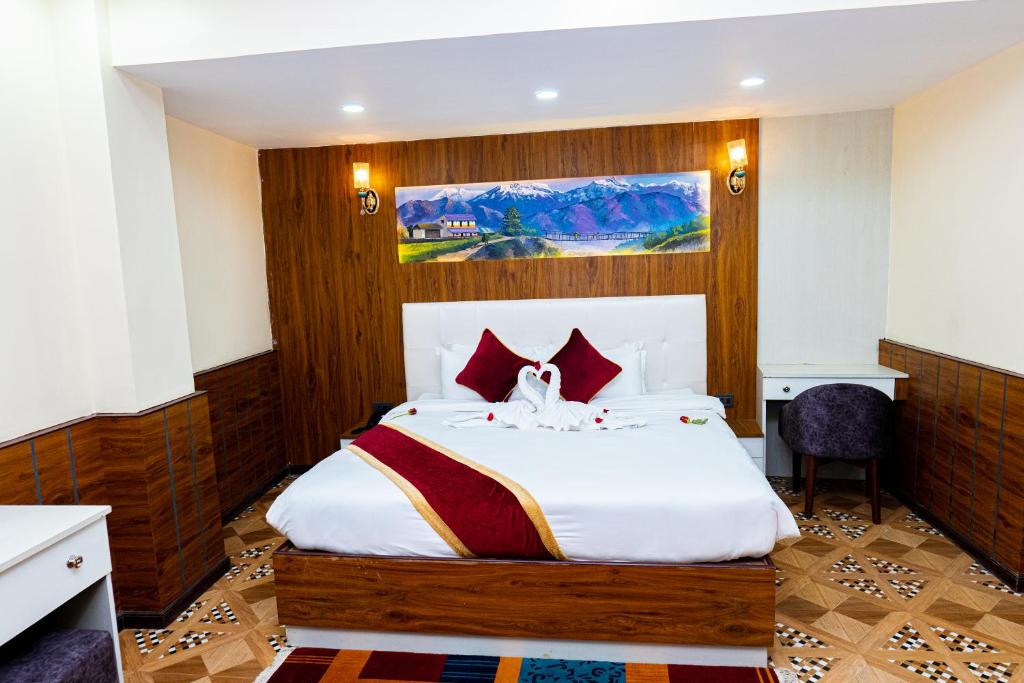 Postel nebo postele na pokoji v ubytování Hotel Palazzo