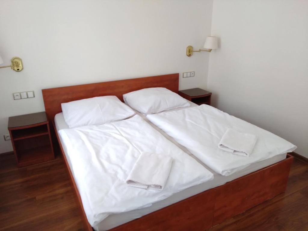 Postel nebo postele na pokoji v ubytování Apartmány u Martina