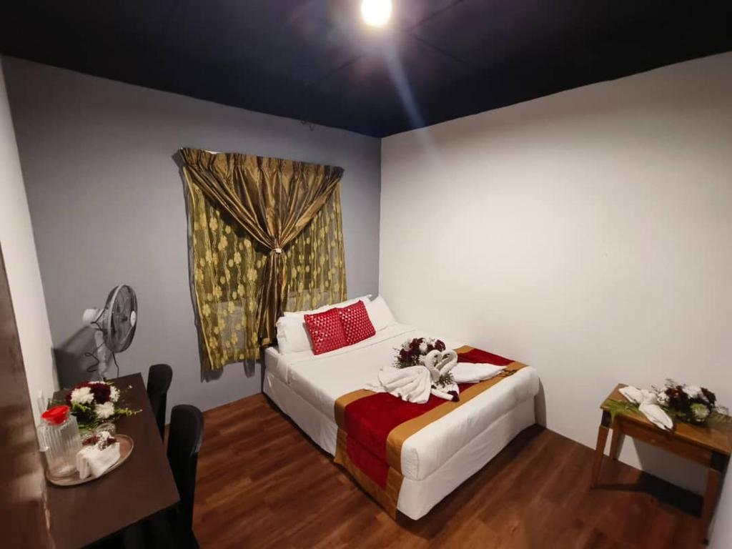 Postel nebo postele na pokoji v ubytování 1 Hati Homestay Sepang