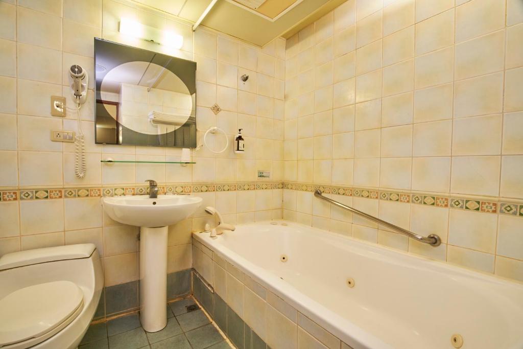 Koupelna v ubytování Tian Long Hotel