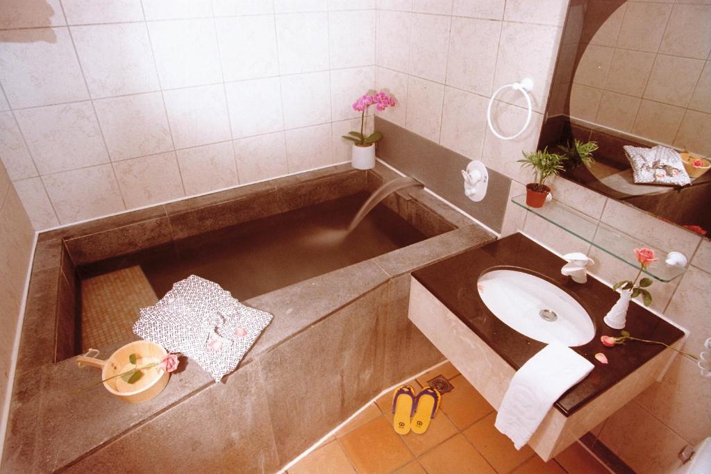 Koupelna v ubytování Tian Long Hotel