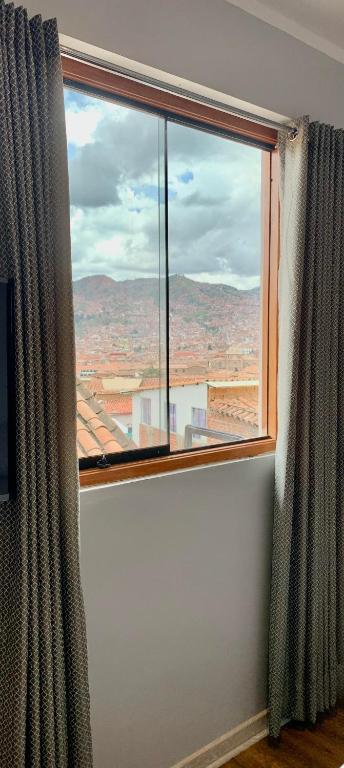 Nespecifikovaný výhled na hory nebo výhled na hory při pohledu z hotelu
