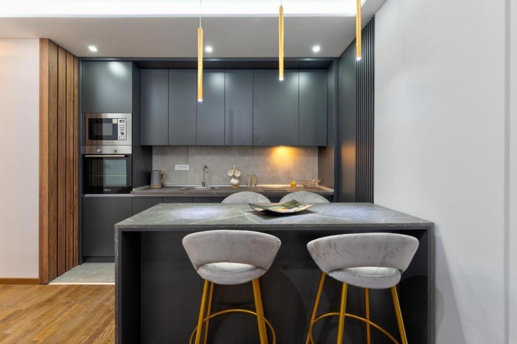 Kuchyň nebo kuchyňský kout v ubytování Mans lux 8 Apartman