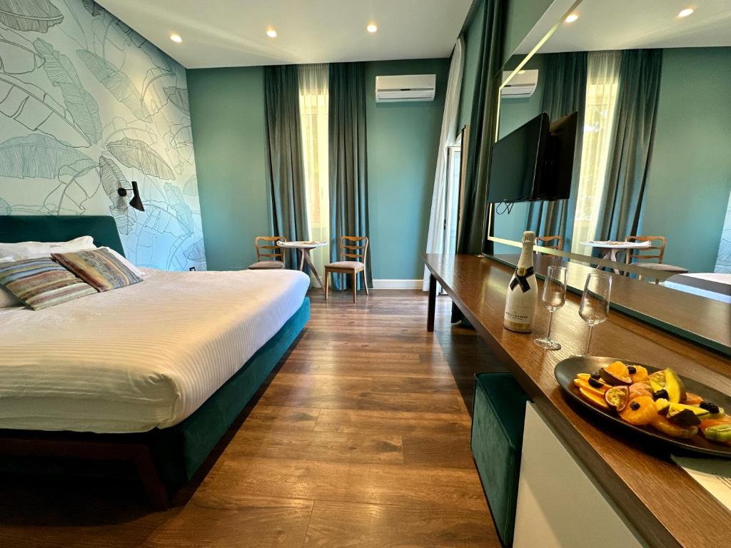 Postel nebo postele na pokoji v ubytování Le Palazzine Hotel