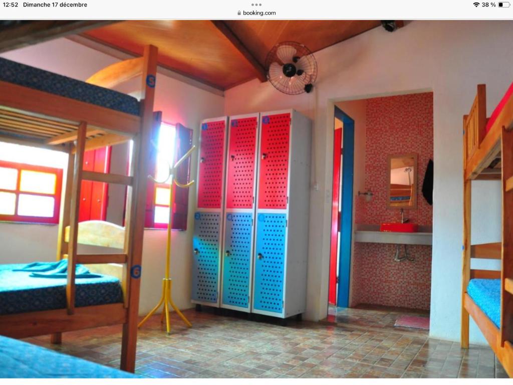 Postel nebo postele na pokoji v ubytování Nomads Trek Hostel Agência
