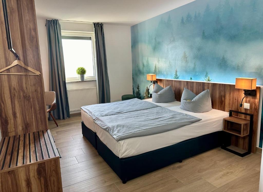 Postel nebo postele na pokoji v ubytování AUSZEIT DAS HOTEL Asbach-Bäumenheim