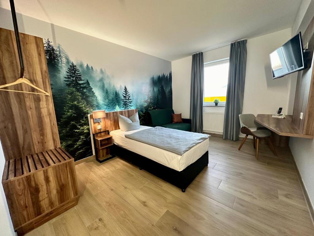 Postel nebo postele na pokoji v ubytování AUSZEIT DAS HOTEL Asbach-Bäumenheim