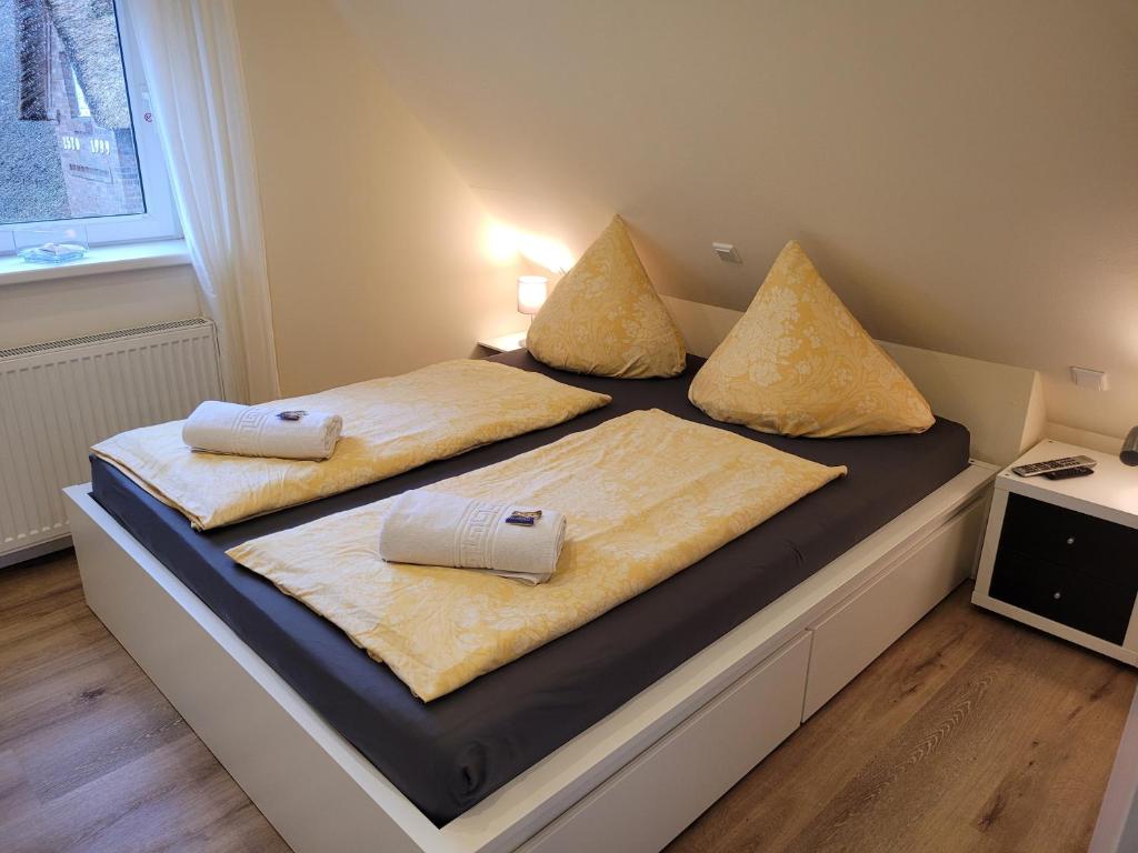 Postel nebo postele na pokoji v ubytování Ferienhaus Wind