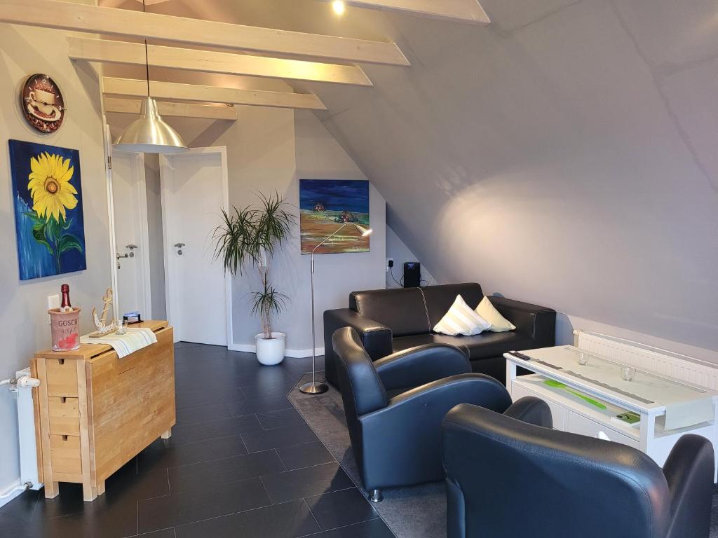 Posezení v ubytování Ferienhaus Wind