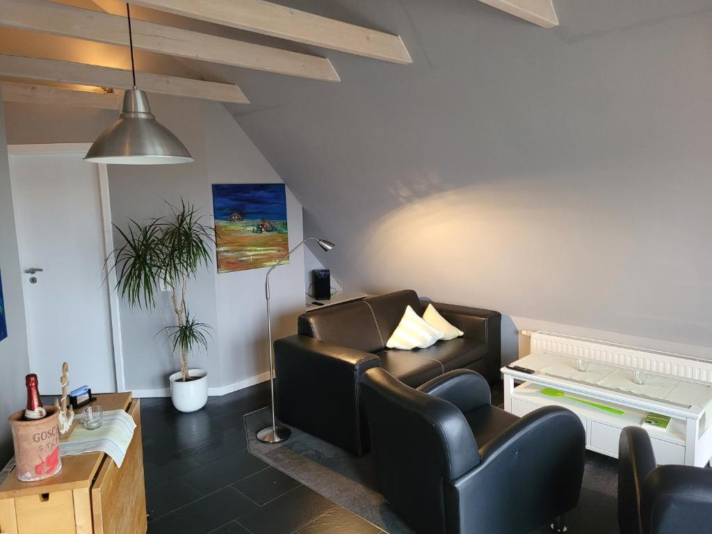 Posezení v ubytování Ferienhaus Wind