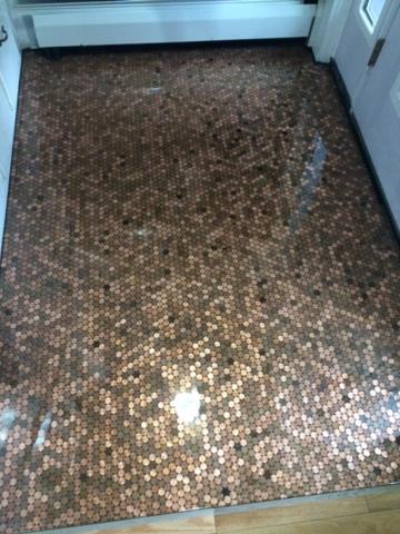 a bathroom floor with a brown and white counter top at Cozy 1882 renovated cape in Plainfield