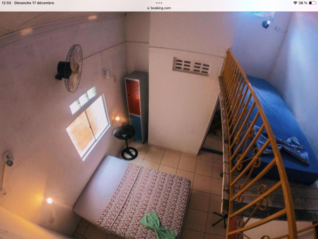 Postel nebo postele na pokoji v ubytování Nomads Trek Hostel Agência