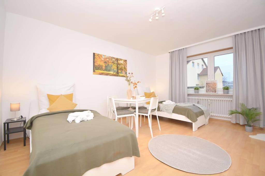 Postel nebo postele na pokoji v ubytování KU01-RI Apartment in Kulmbach EG