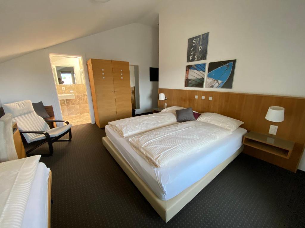 Postel nebo postele na pokoji v ubytování Businesshotel Lux