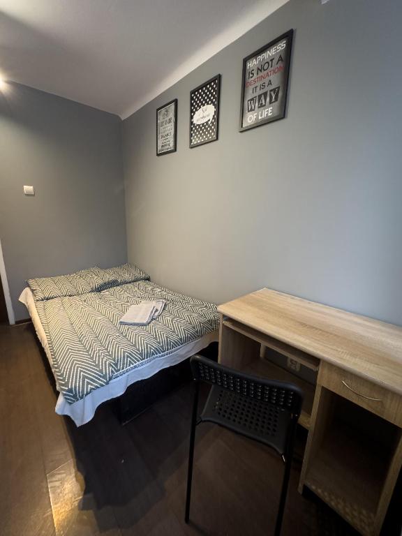 Posteľ alebo postele v izbe v ubytovaní Kwadrat B&B Jałowego