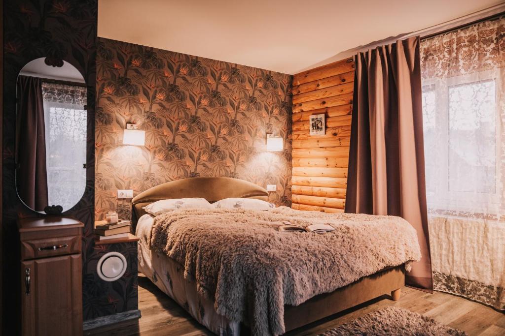 Postel nebo postele na pokoji v ubytování Guest House Lorem