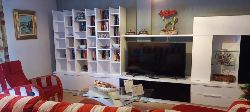 TV a/nebo společenská místnost v ubytování Casa Rotella