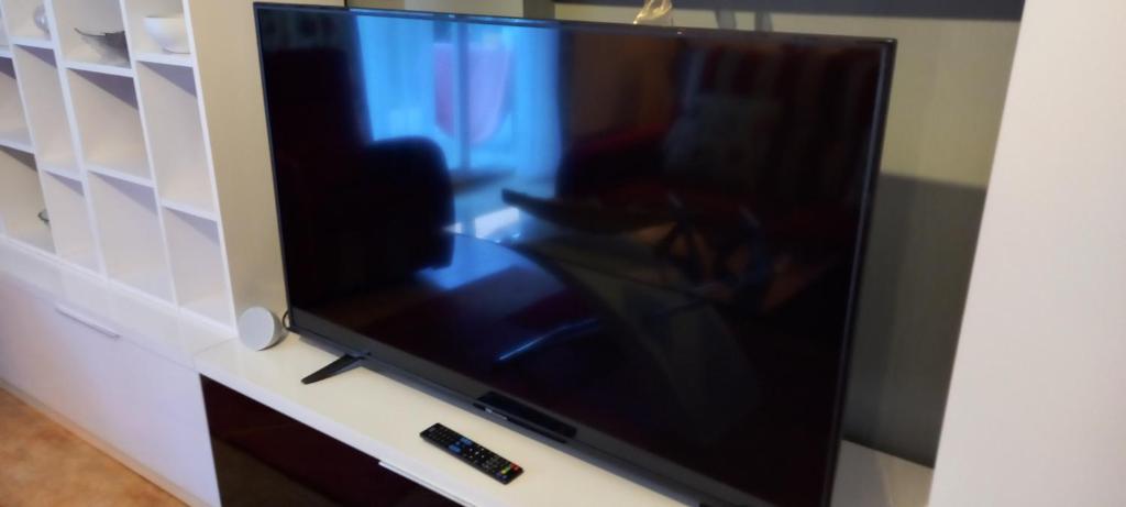 TV a/nebo společenská místnost v ubytování Casa Rotella